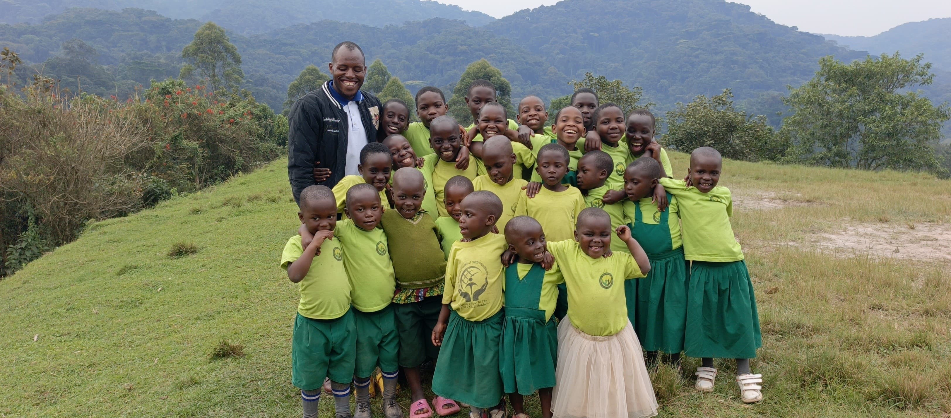 Rushaga Vulnerable Child Foundation team and children working together in community programs